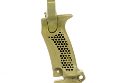 The hammer grip of the Hammer. Shown in green from the left.